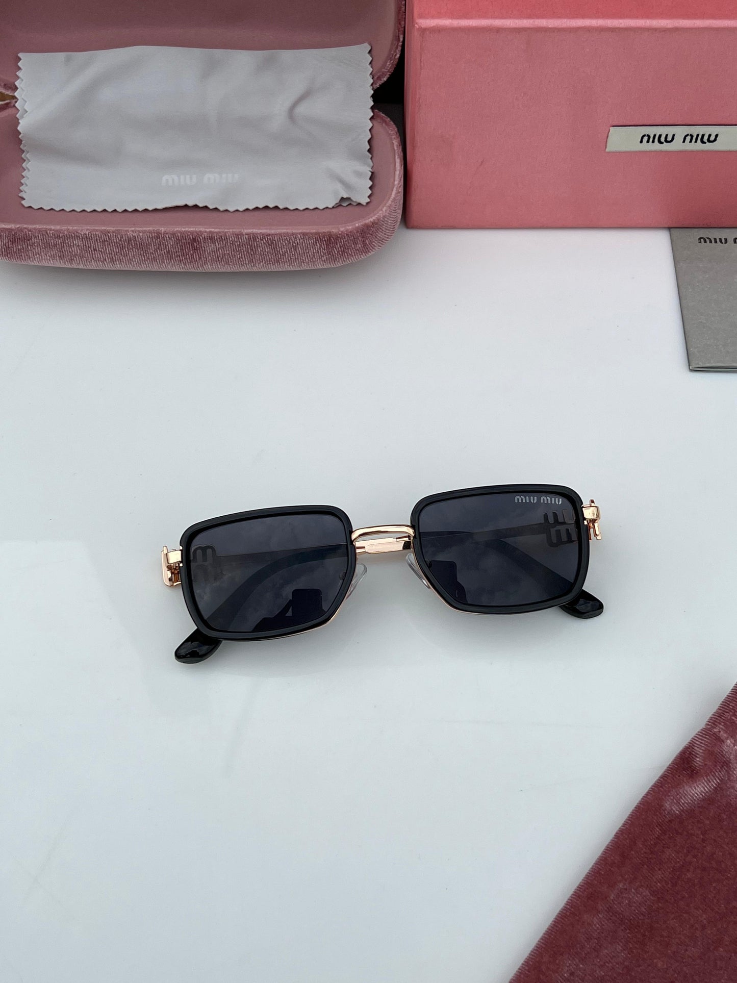 MIU MIU SUNGLASSES