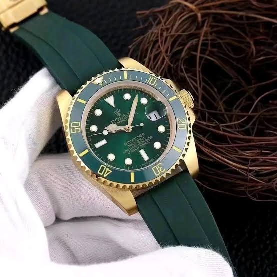 ROLEX GREEN GOLD WATCH