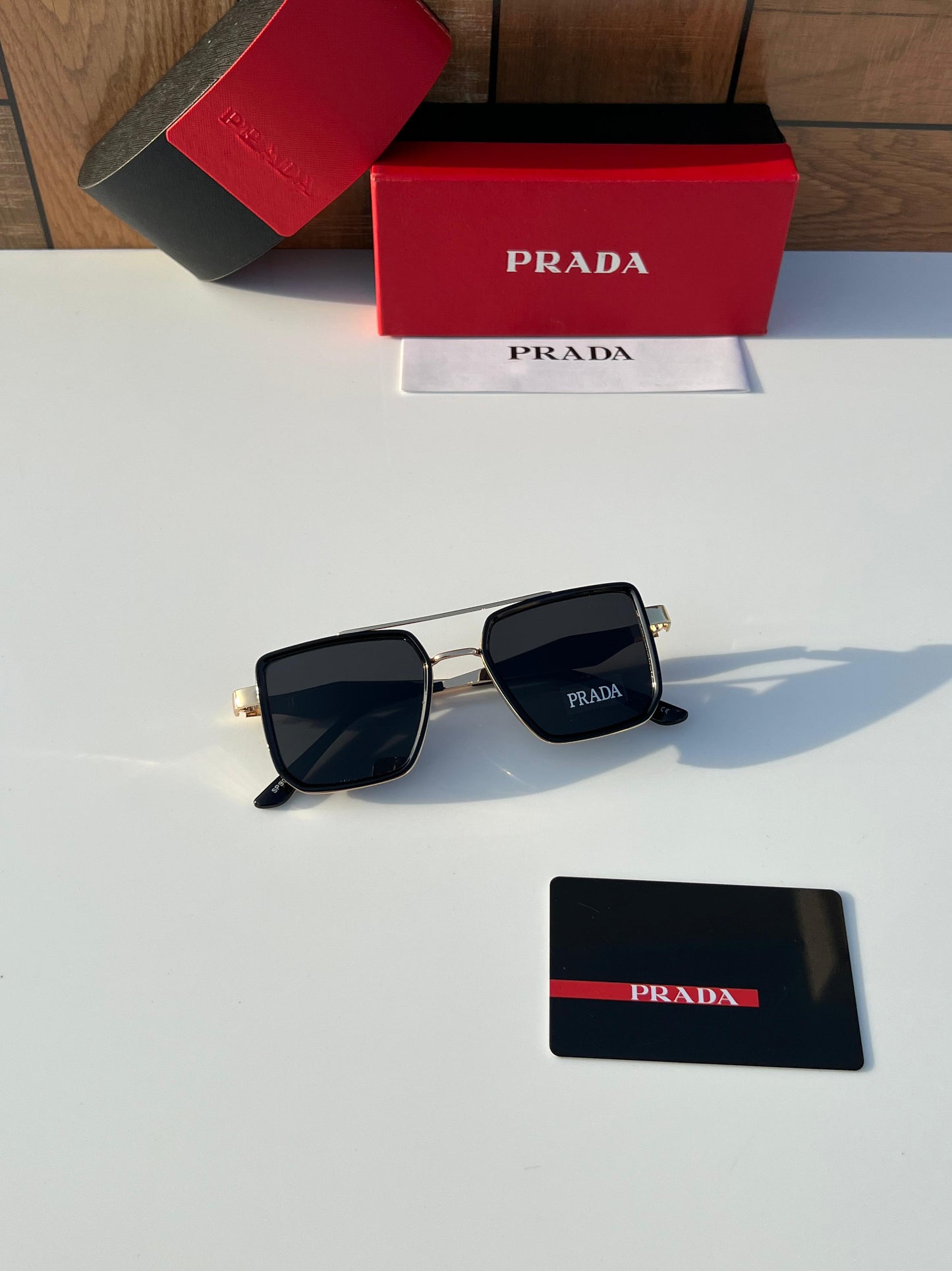 PRADA SUNGLASSES