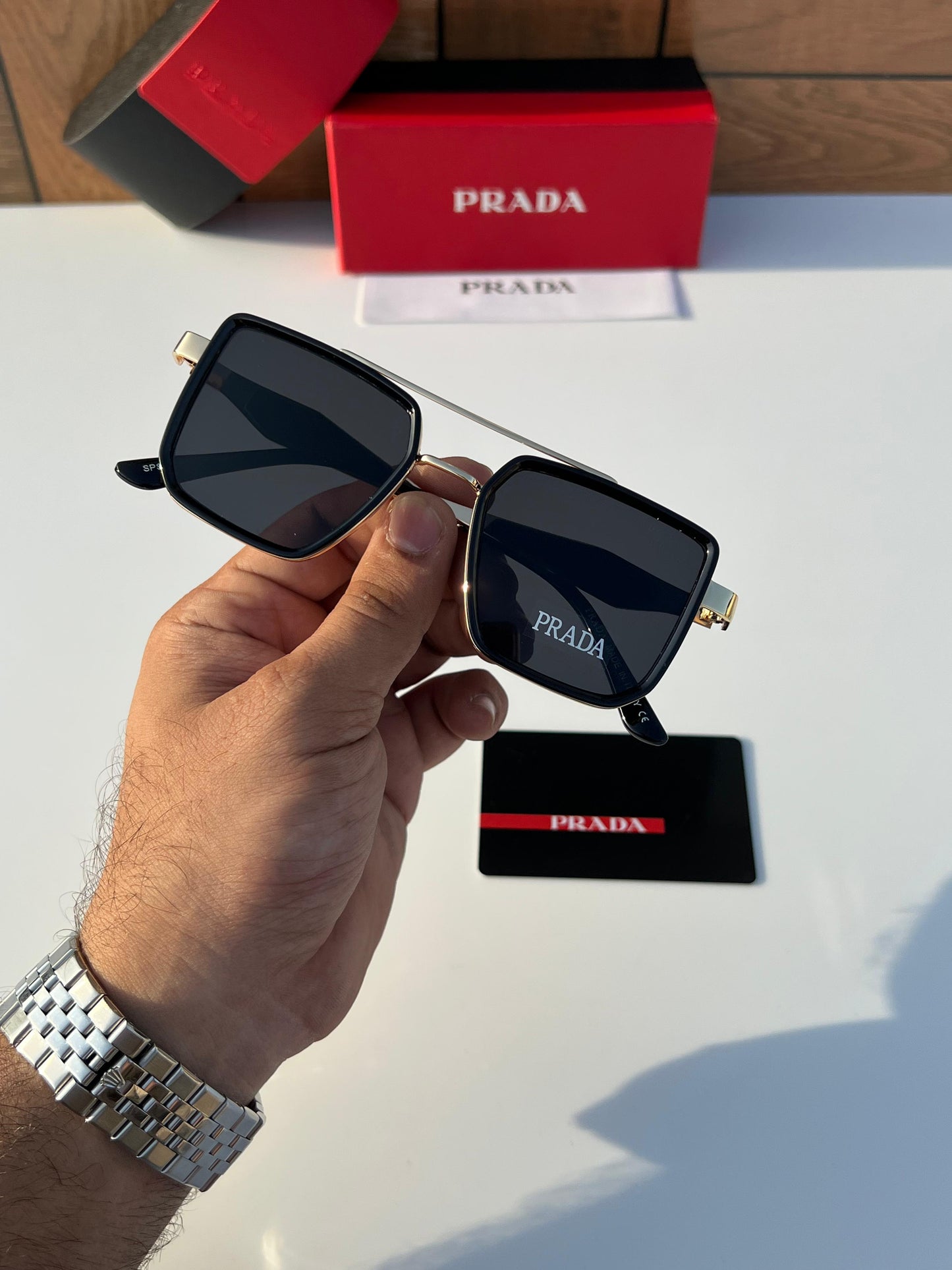 PRADA SUNGLASSES