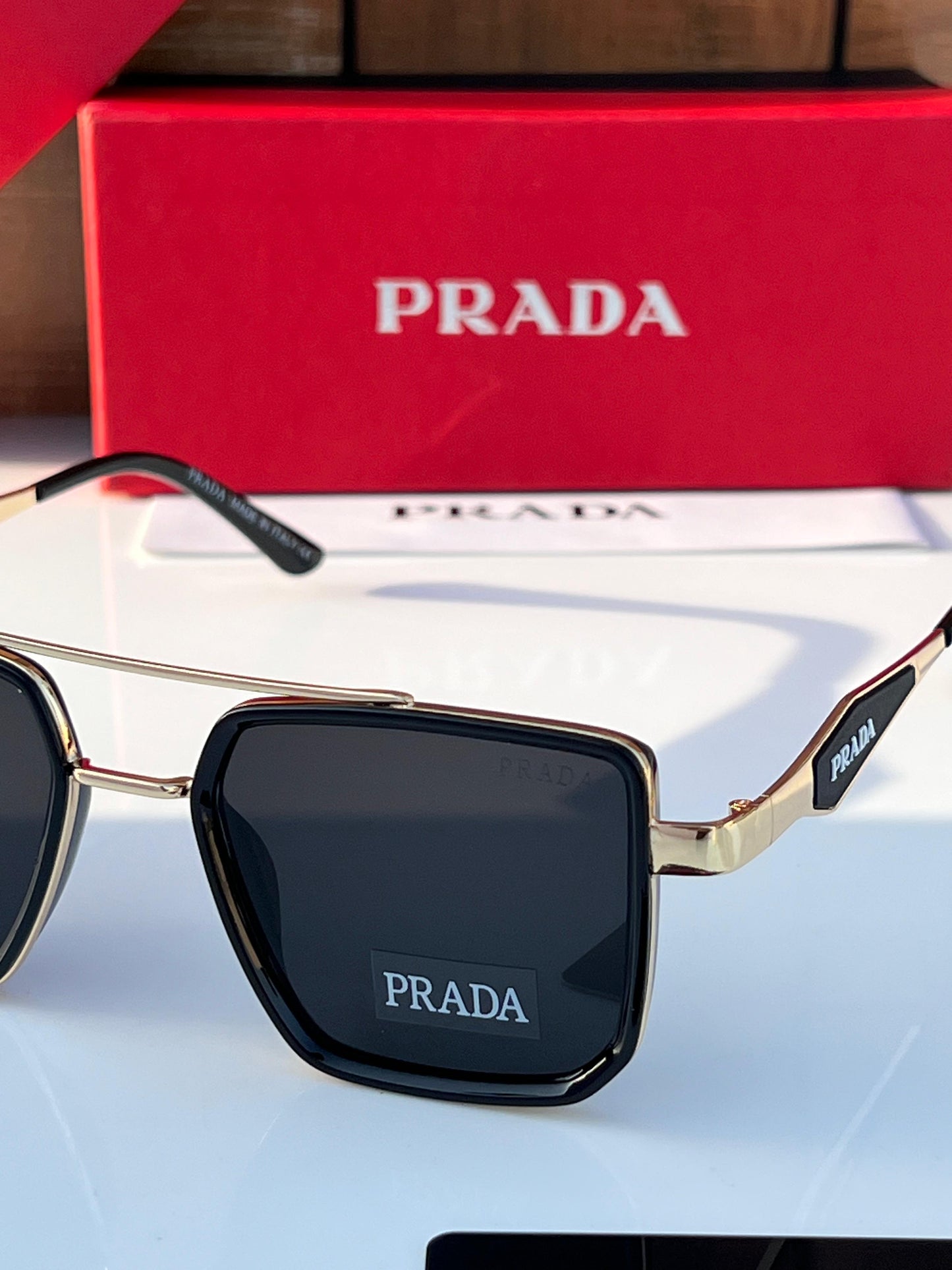PRADA SUNGLASSES