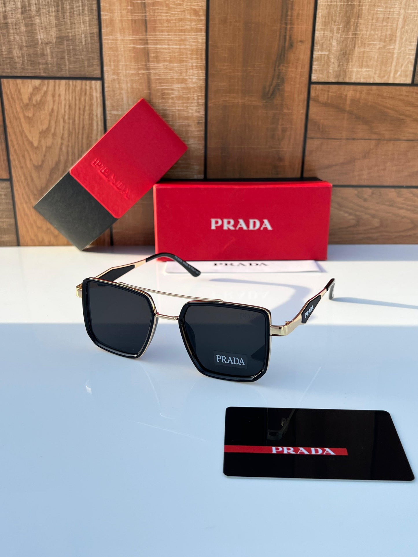 PRADA SUNGLASSES
