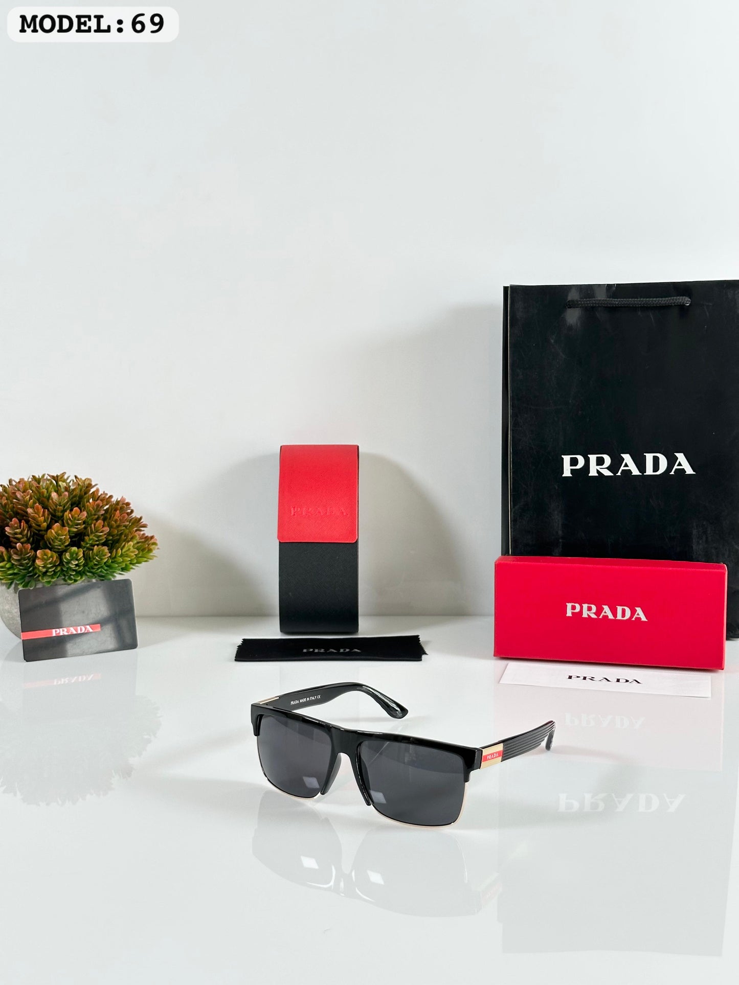 PRADA SUNGLASSES