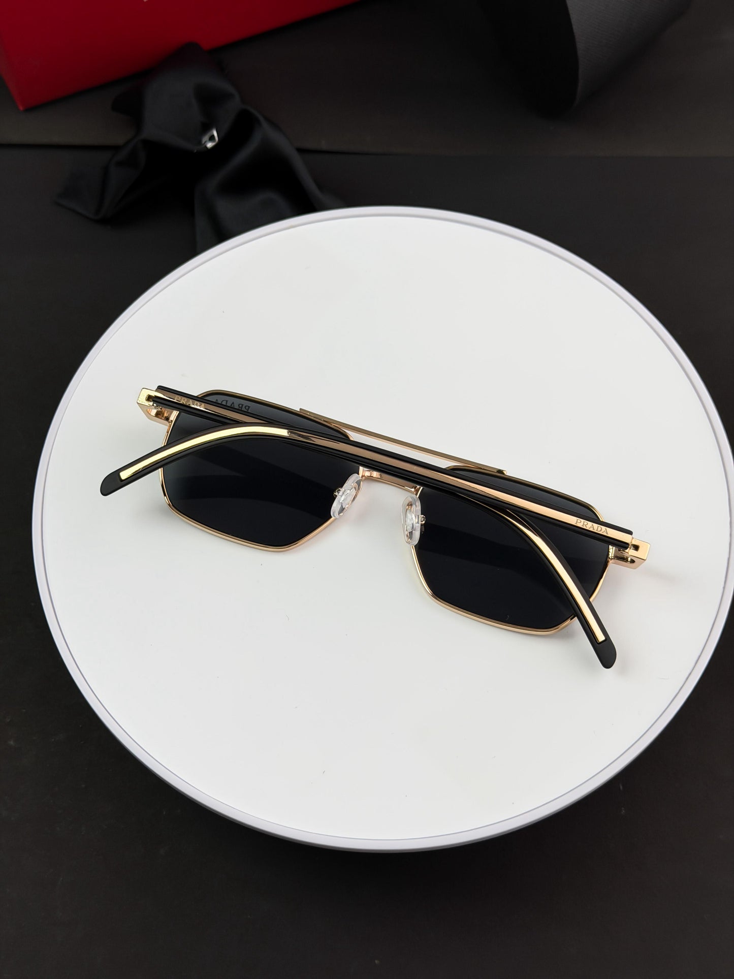 PRADA GOLD BLACK SUNGLASSES