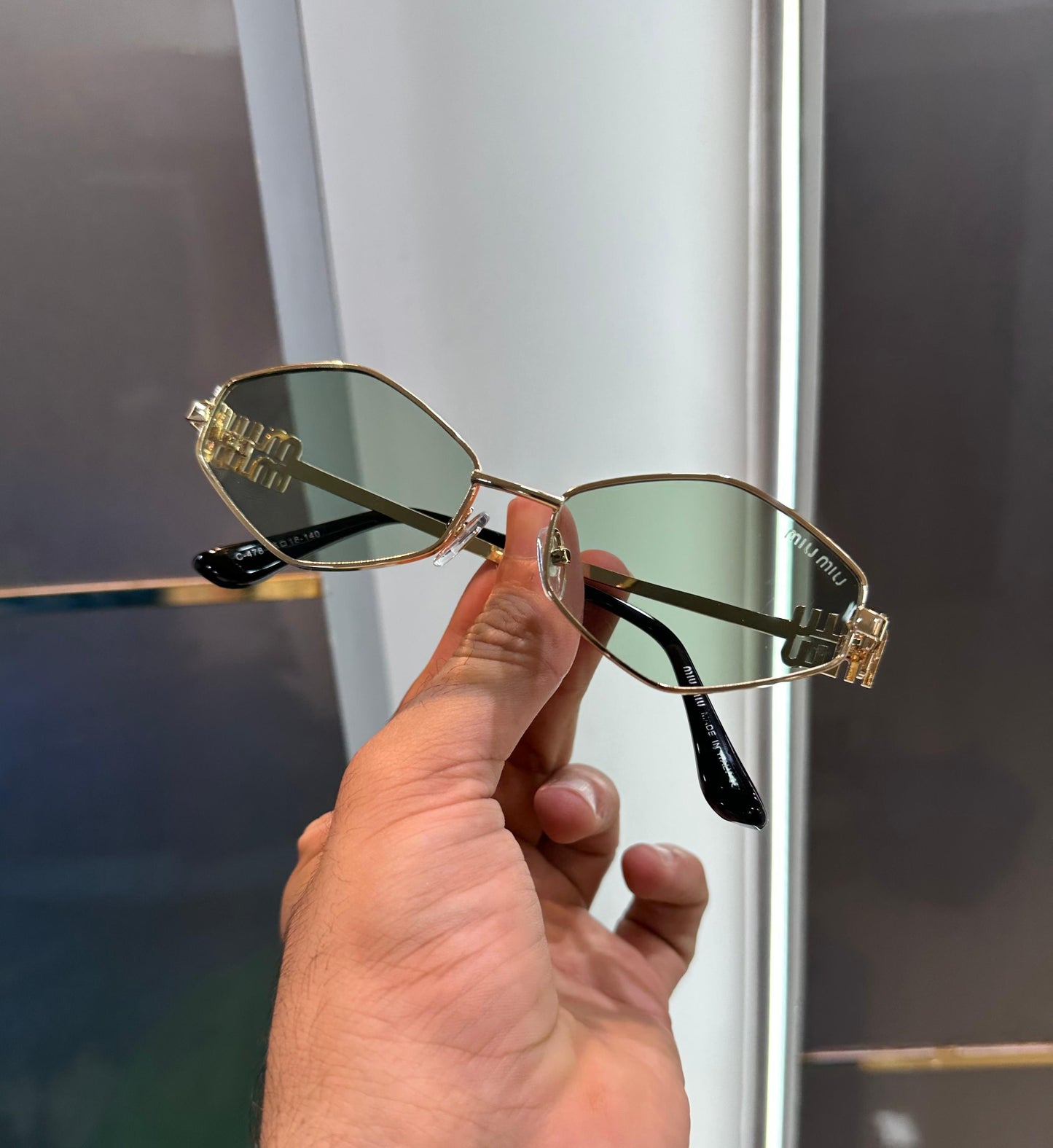 MIU MIU SUNGLASS