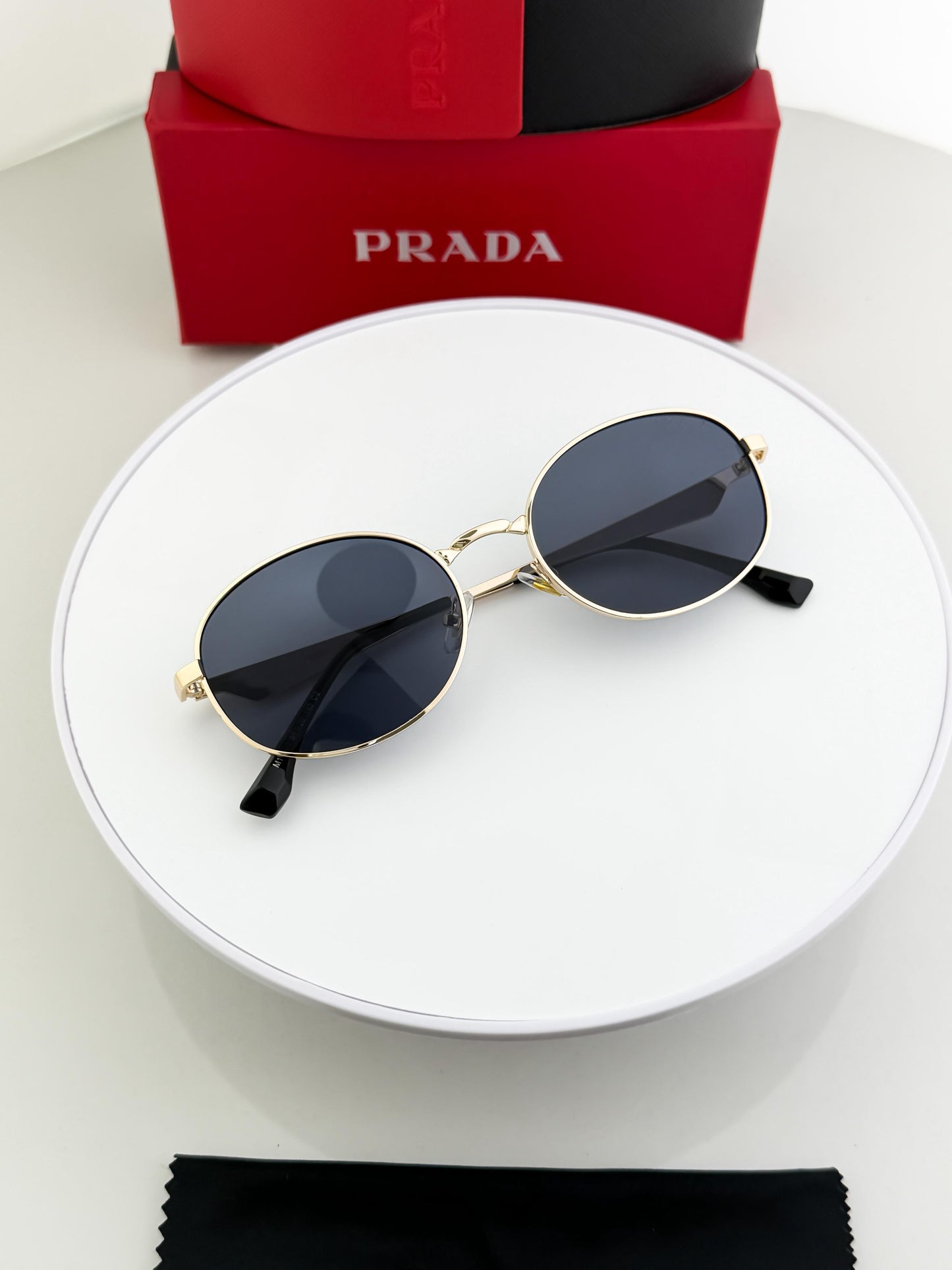 PRADA SUNGLASSES