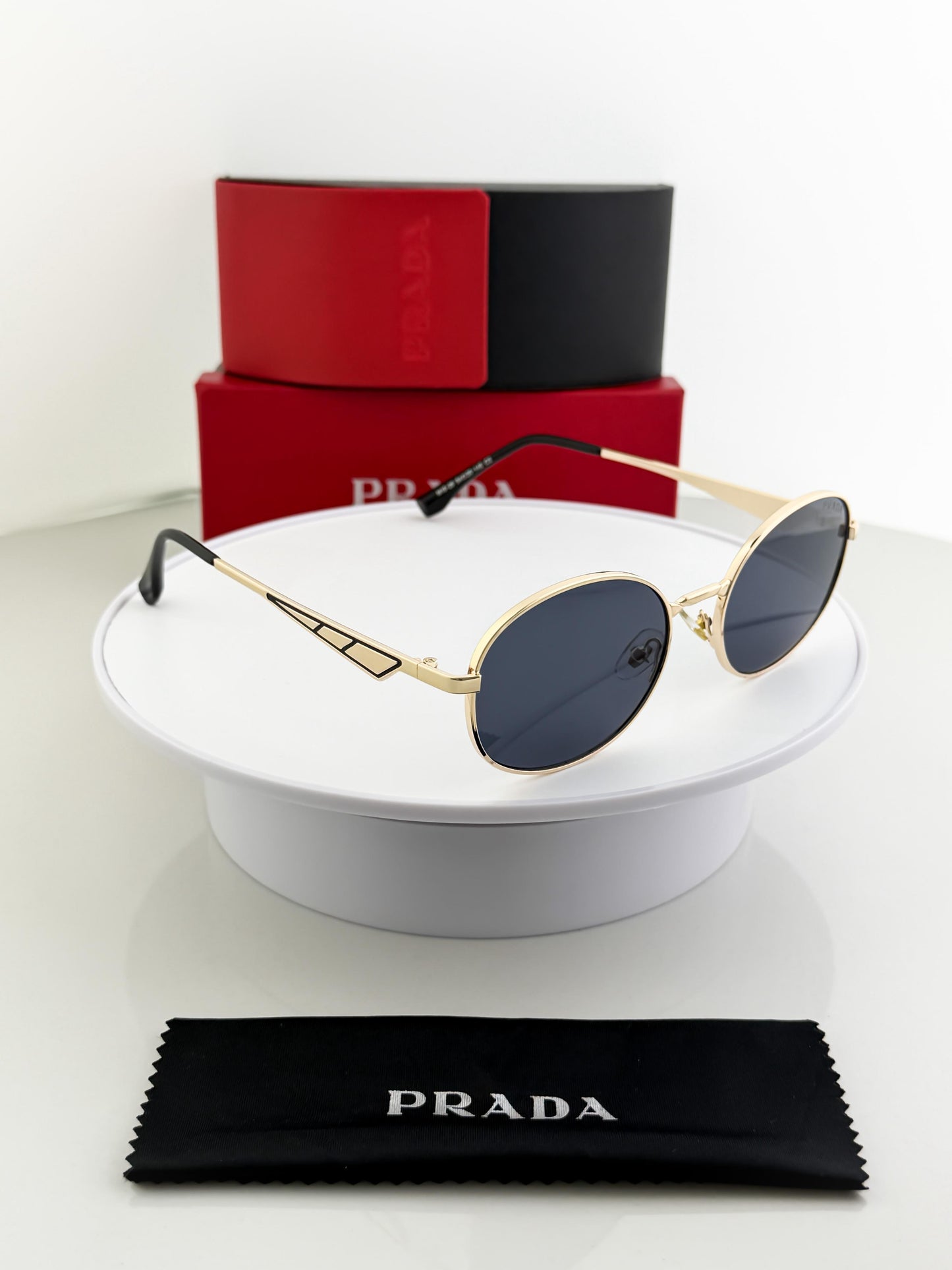 PRADA SUNGLASSES