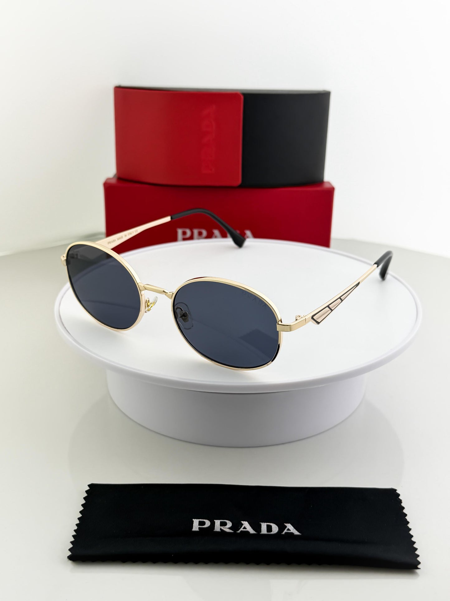 PRADA SUNGLASSES