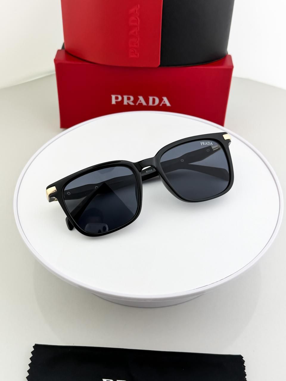 PRADA GOLD BLACK