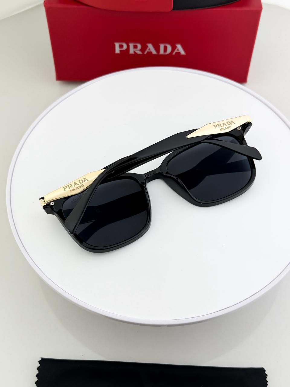 PRADA GOLD BLACK