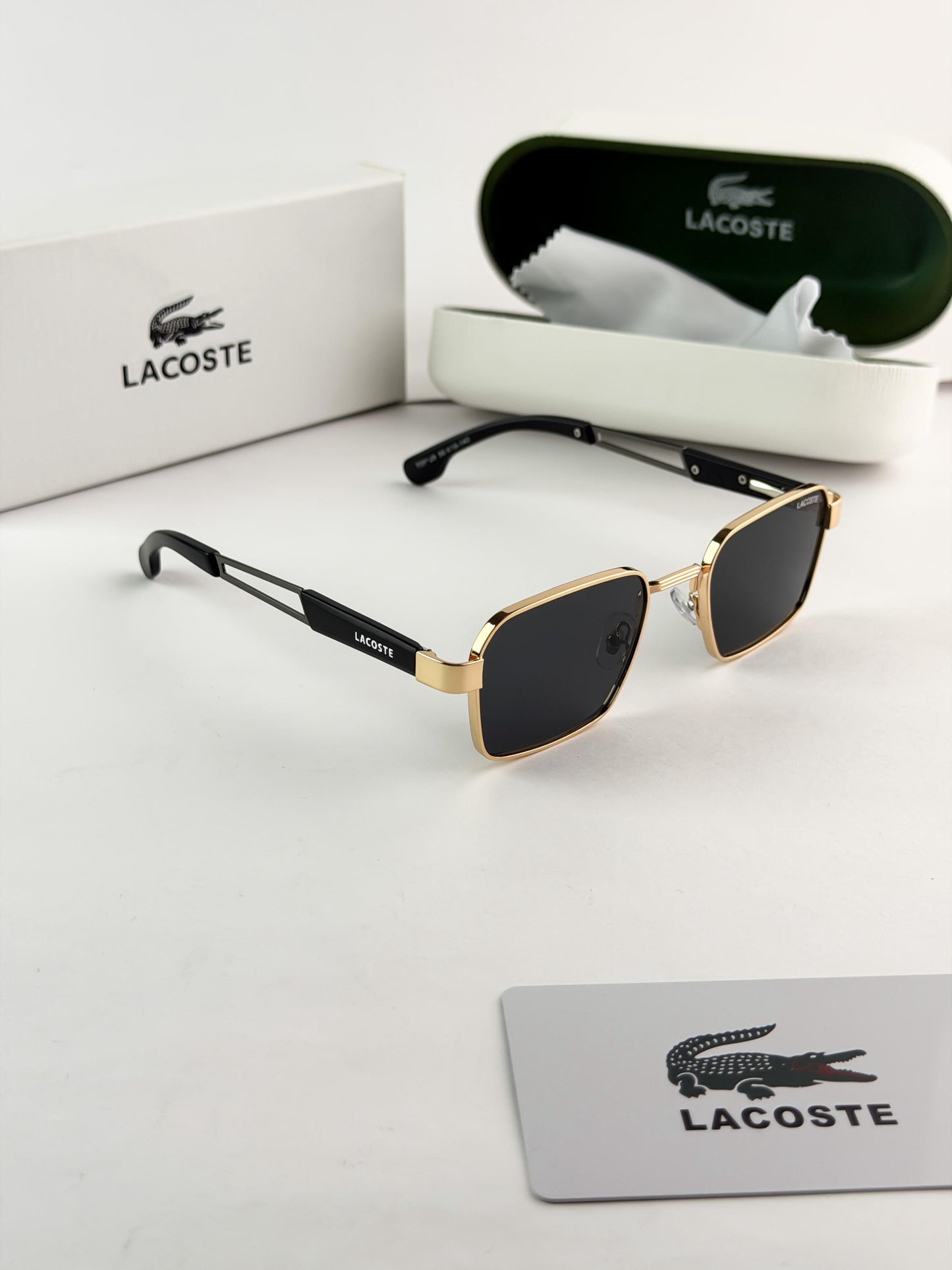 LACOSTE GOLD BLACK SUNGLASS