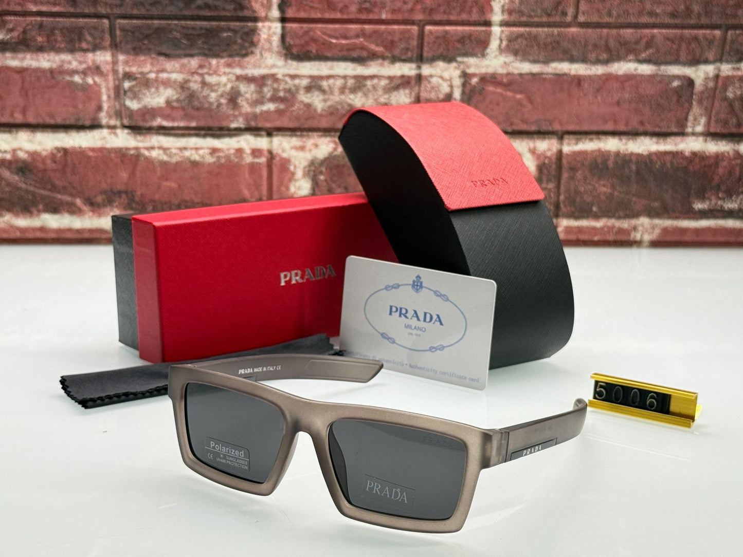 PRADA POLARIZED LENS SUNGLASS