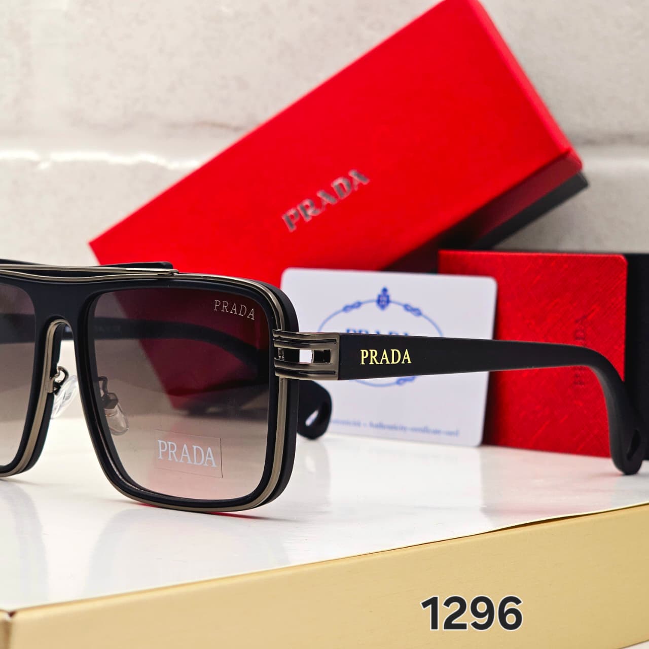 PRADA SUNGLASSES