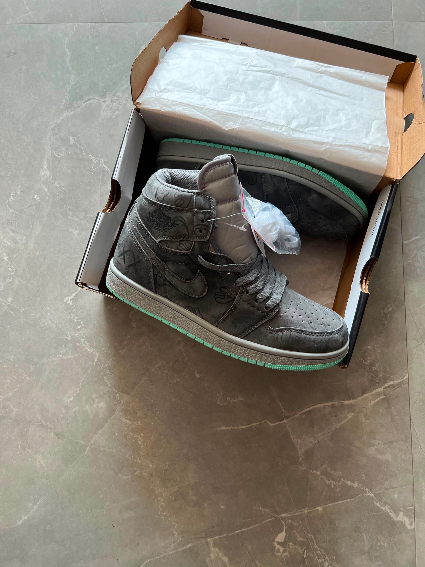 AIR JORDANS ONE KAWS