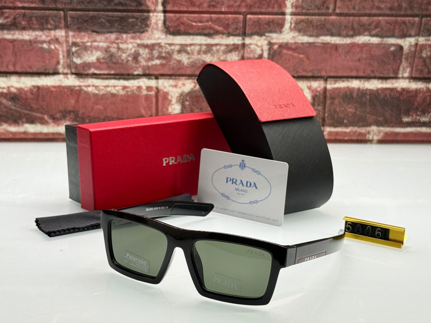 PRADA POLARIZED LENS SUNGLASS