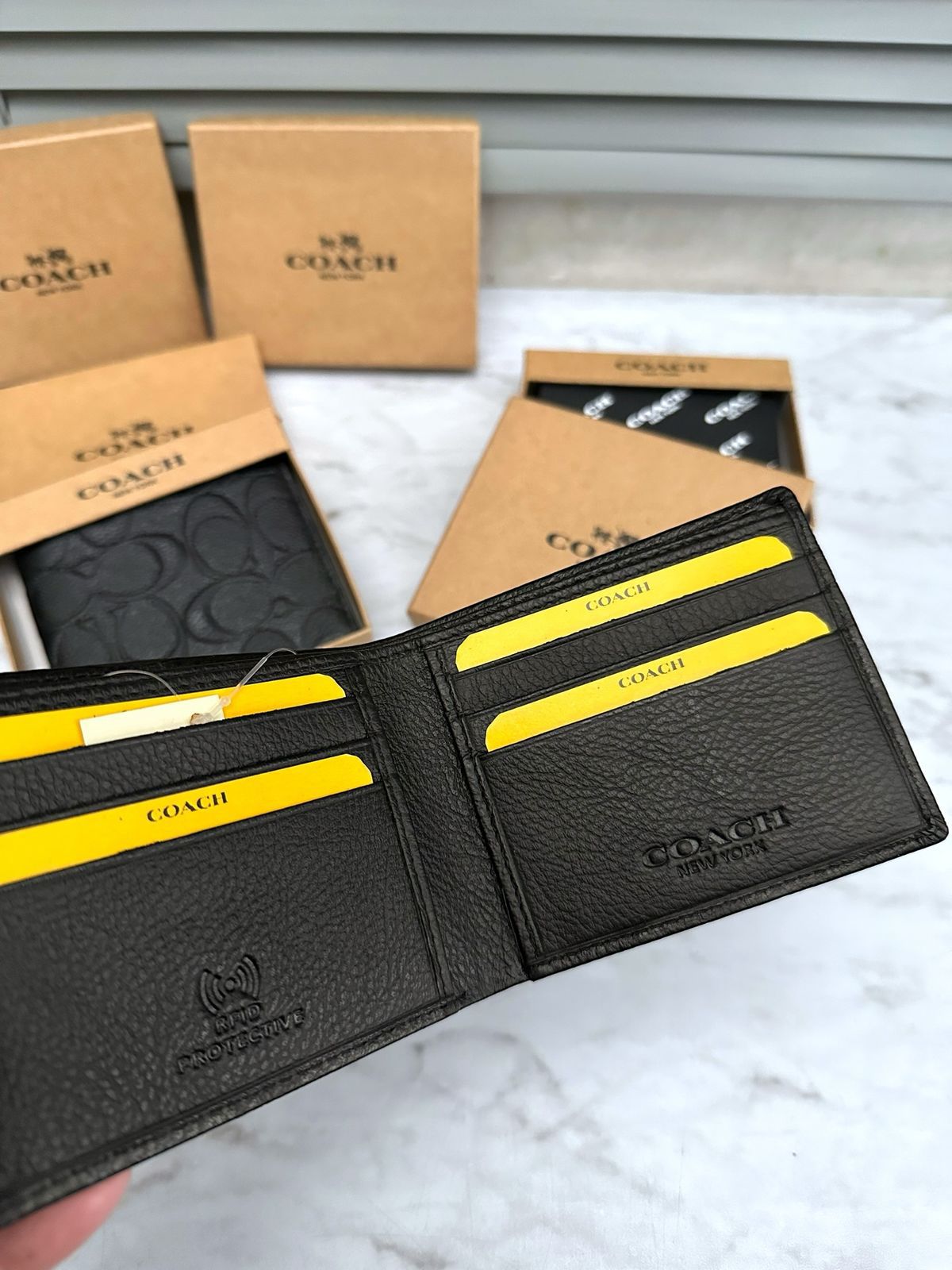 COACH LEATHER WALLETS