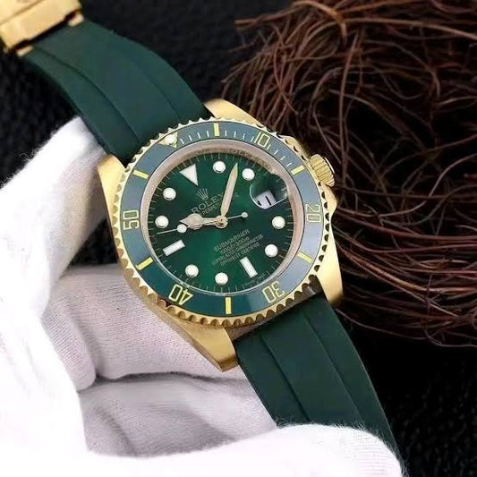 ROLEX GREEN GOLD WATCH